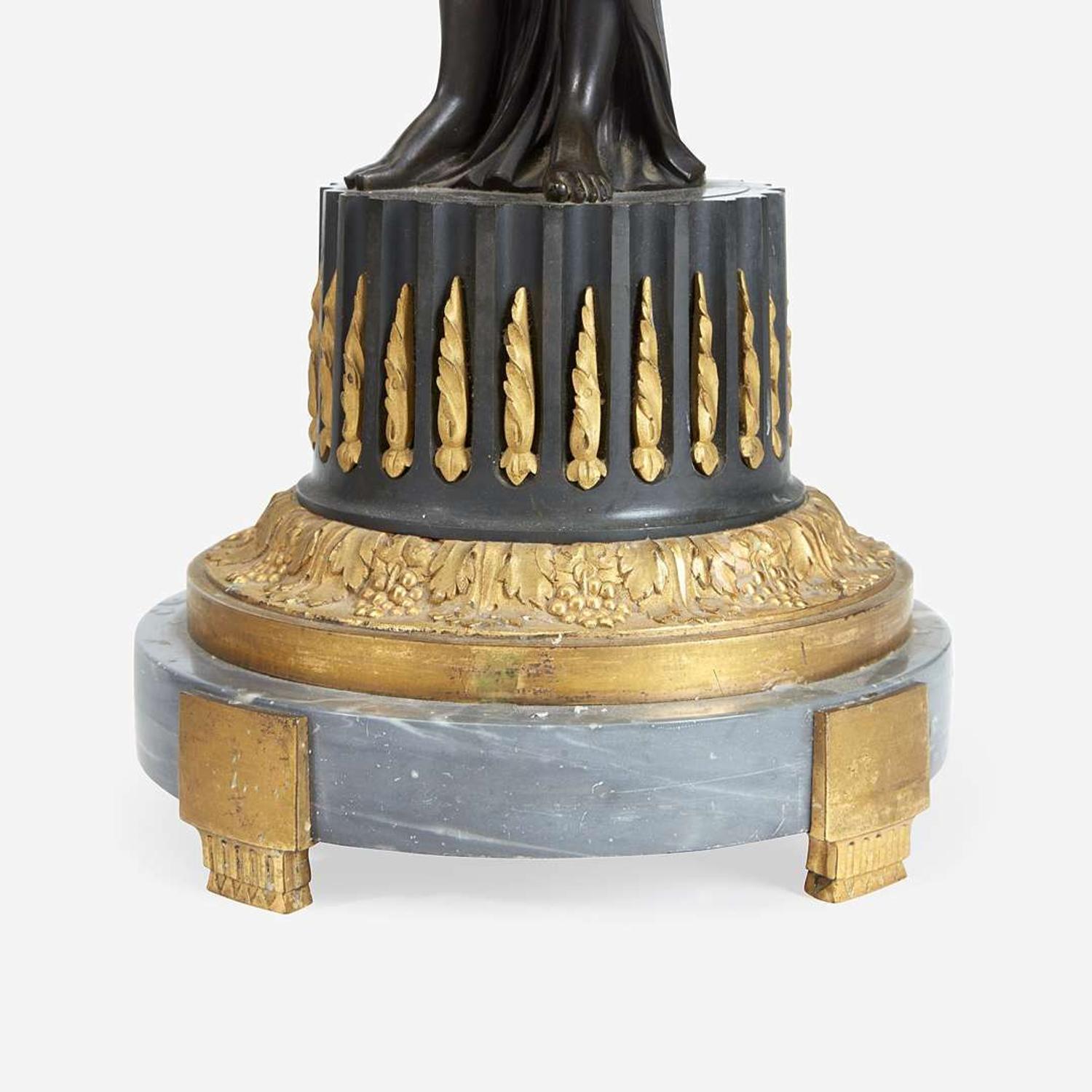 A Pair of Louis XVI Style Gilt and Patinated Bronze Figural Four-Light Candelabra 19th century