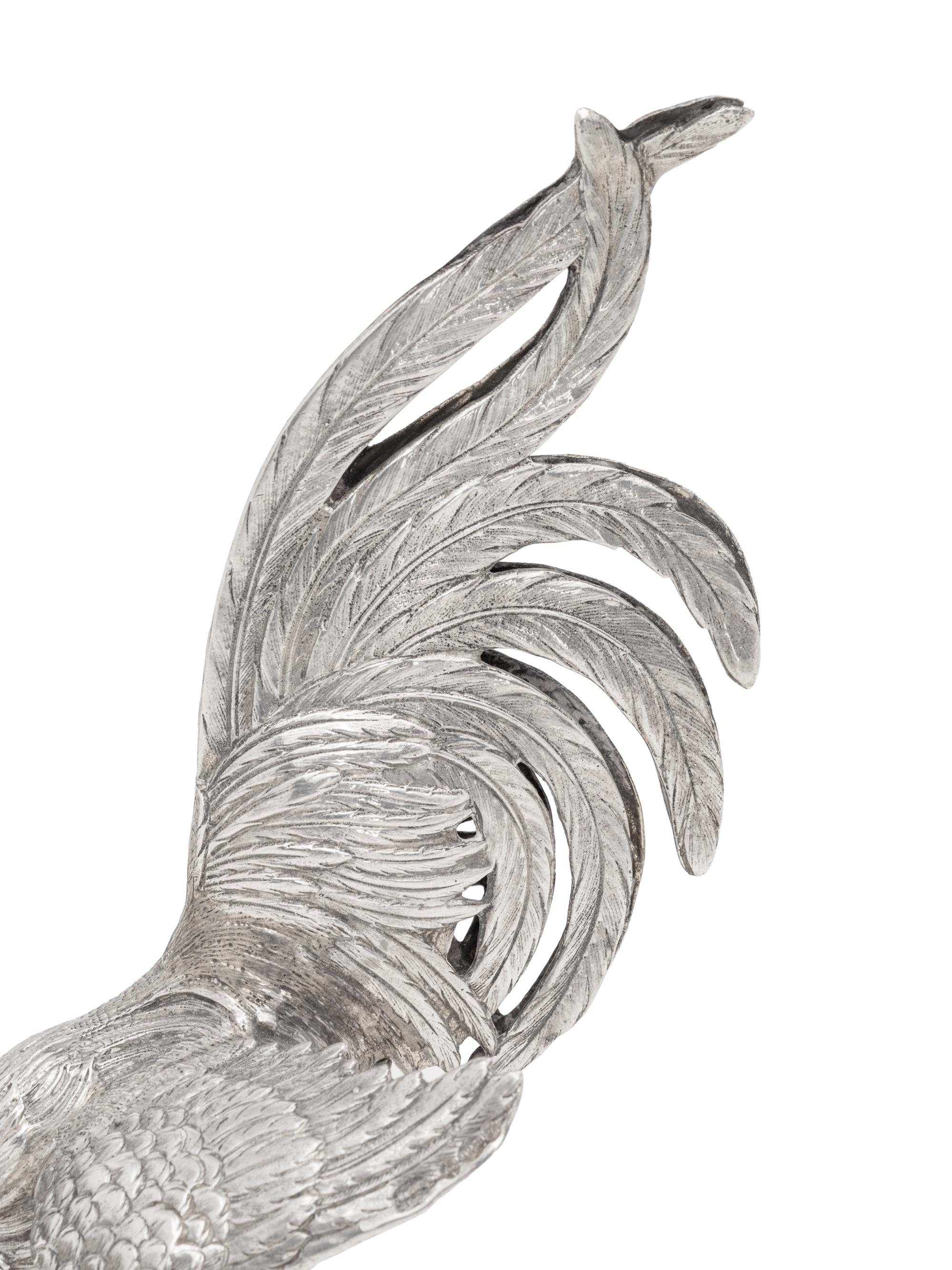 A Pair of Continental Silver Cockerels