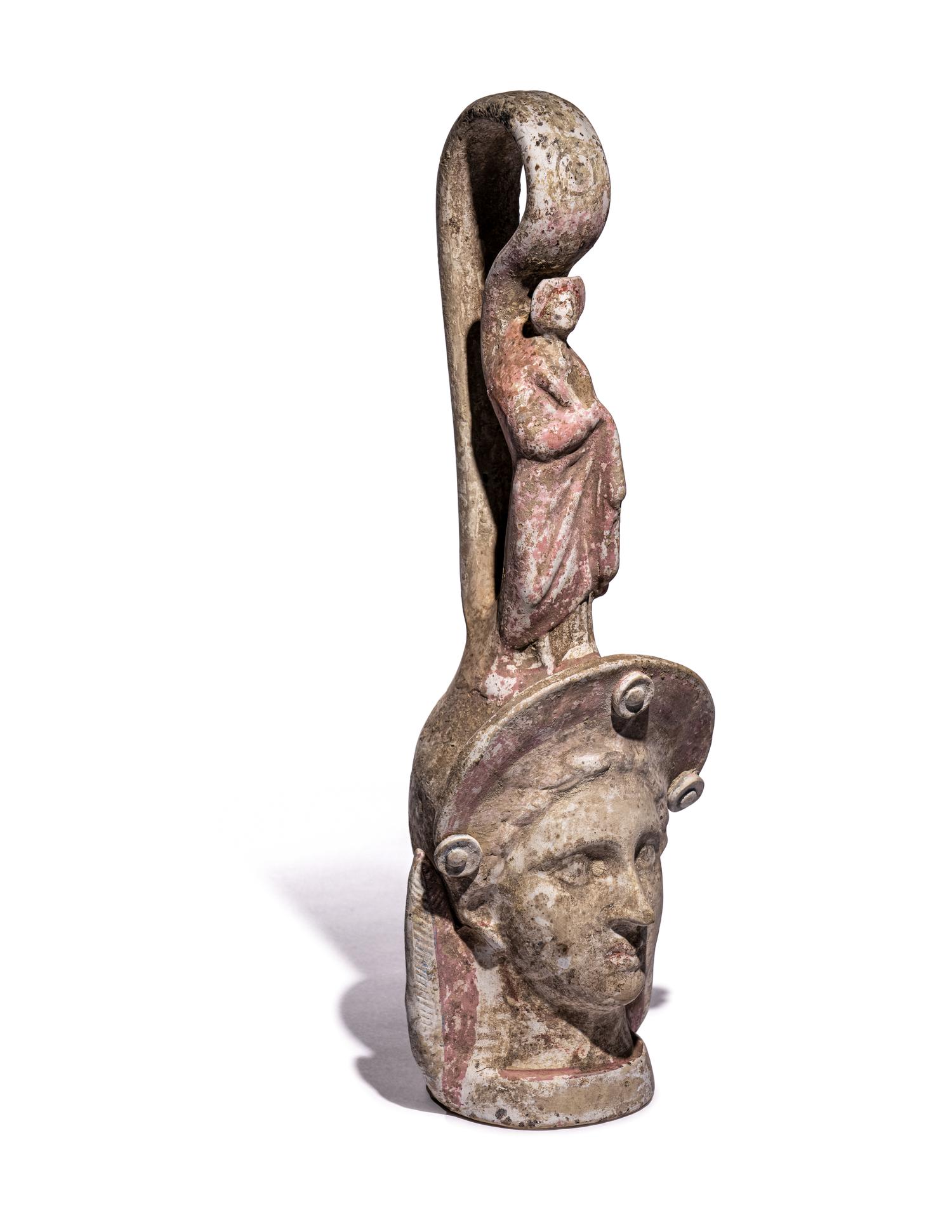 A Canosan Pottery Figural Oinochoe