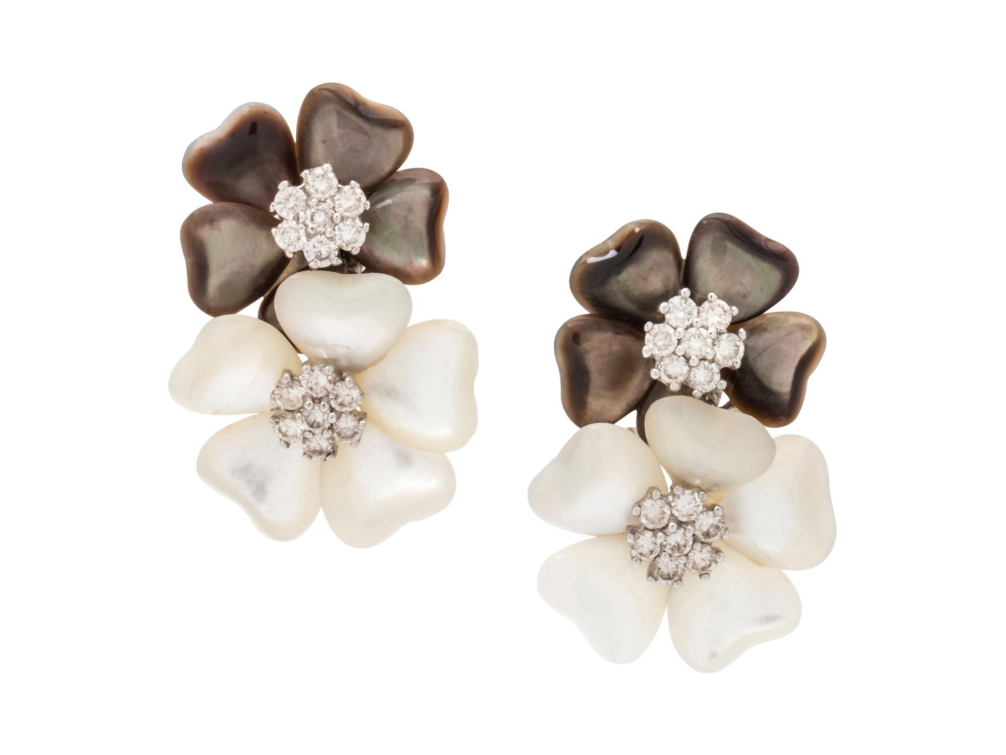 A Pair of 18 Karat White Gold, Diamond and Mother-of-Pearl Flower Cluster Earclips,