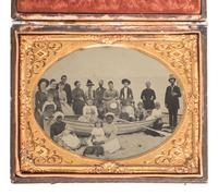 [AFRICAN AMERICANA - EARLY PHOTOGRAPHY]. Half plate group portrait featuring 20 family members and 2 African American nannies.