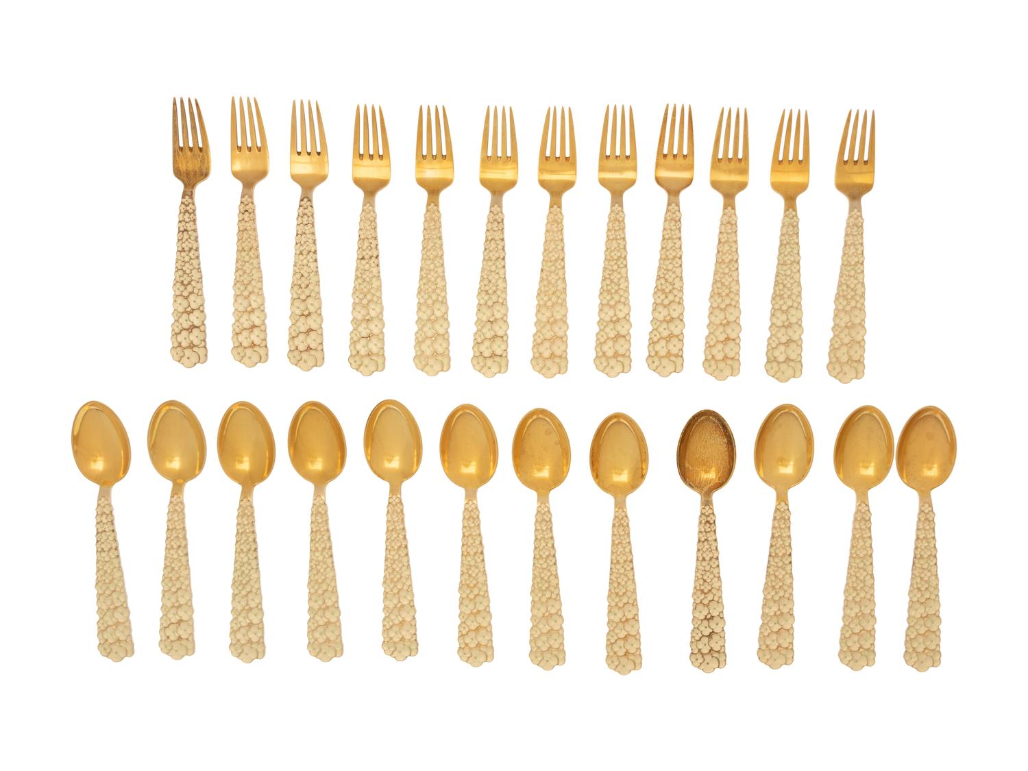 A Set of Danish Enameled Silver-Gilt Flatware Articles
