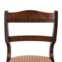 A Set of Eight Regency Brass Inlaid Mahogany Dining Chairs