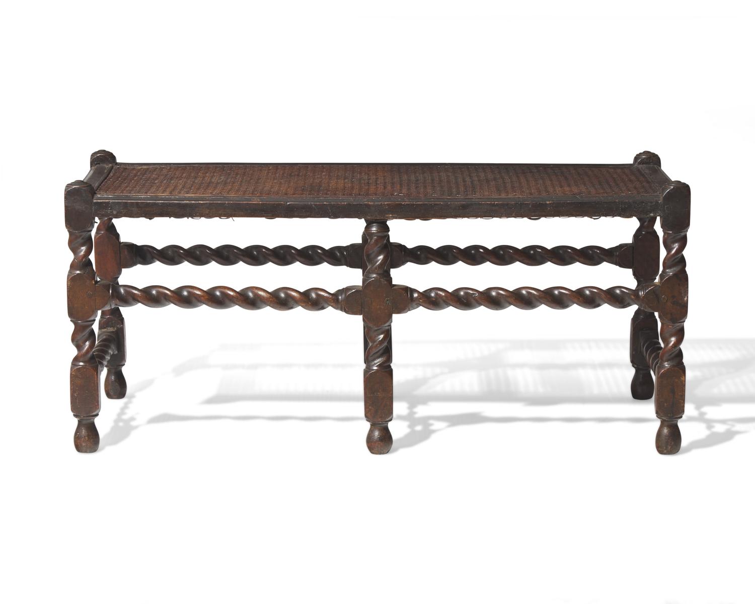 A Charles II Carved and Caned Walnut Bench, Late 17th Century