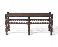 A Charles II Carved and Caned Walnut Bench, Late 17th Century