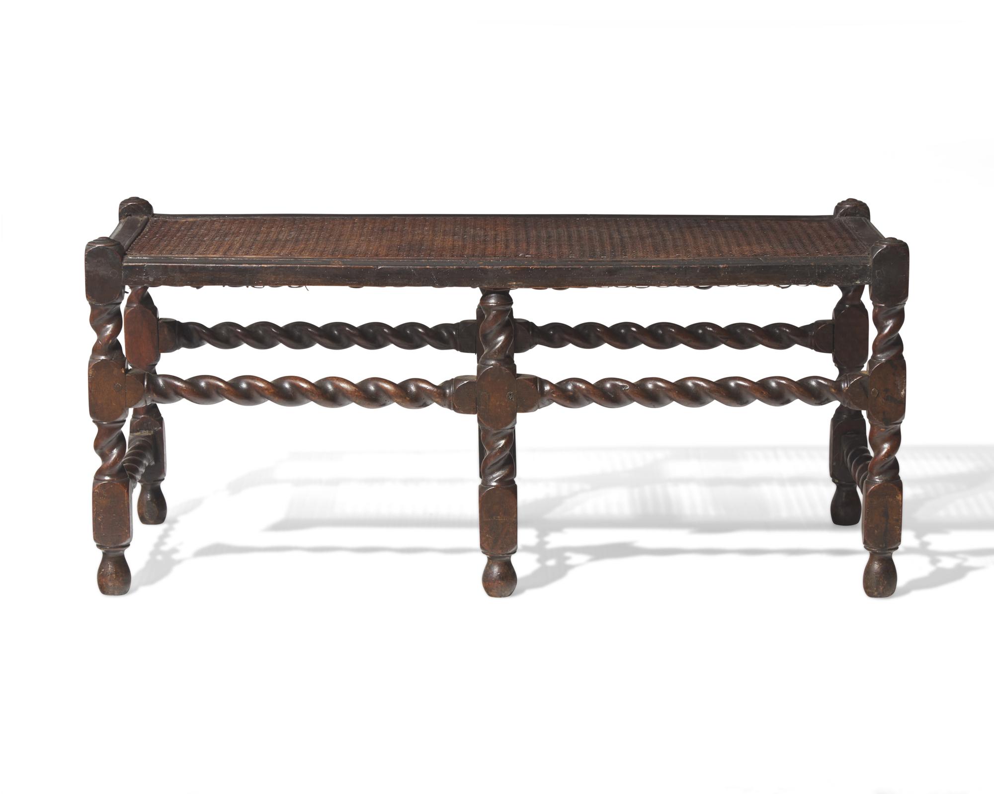 A Charles II Carved and Caned Walnut Bench, Late 17th Century