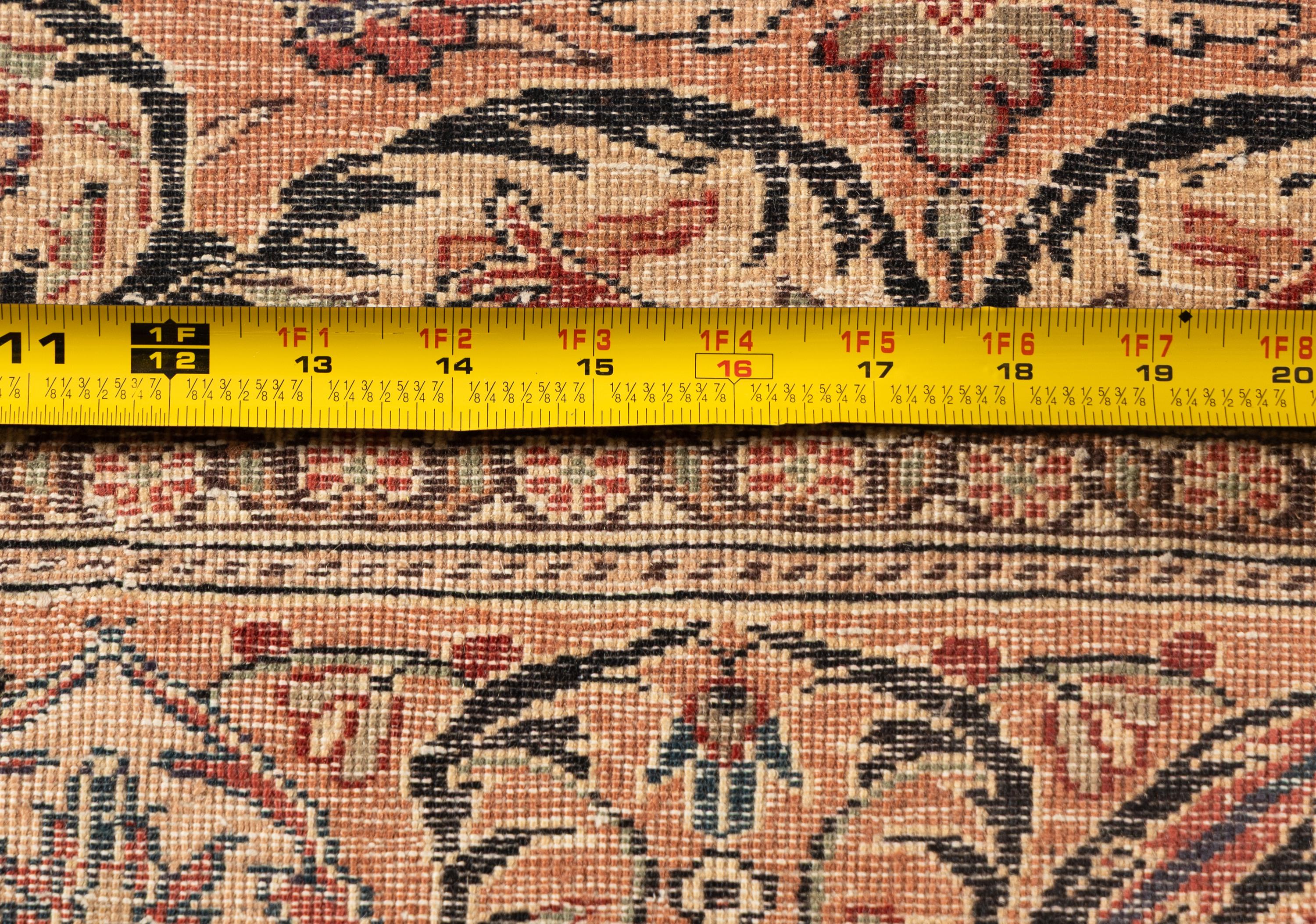An Indian or Qom Rug