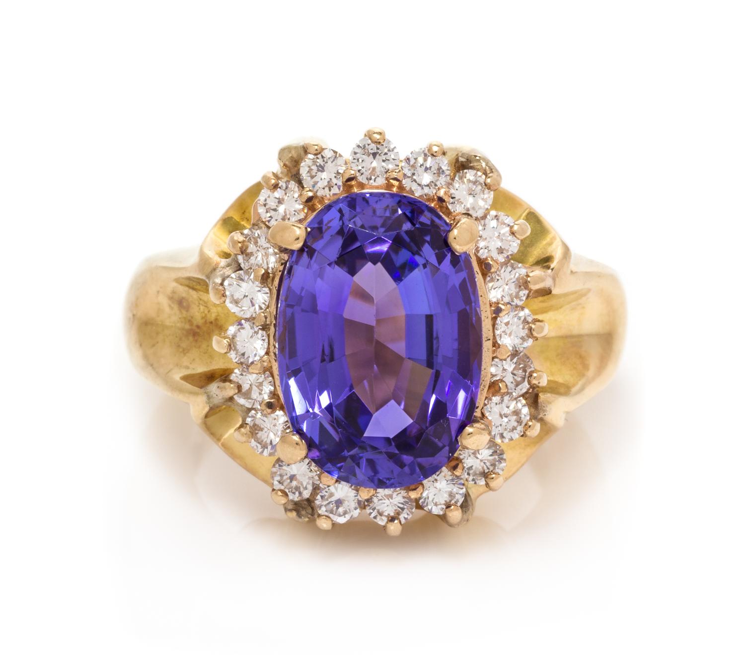 A Yellow Gold, Tanzanite and Diamond Ring, 14.85 dwts.
