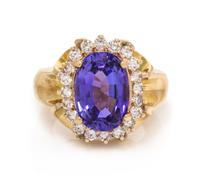 A Yellow Gold, Tanzanite and Diamond Ring, 14.85 dwts.