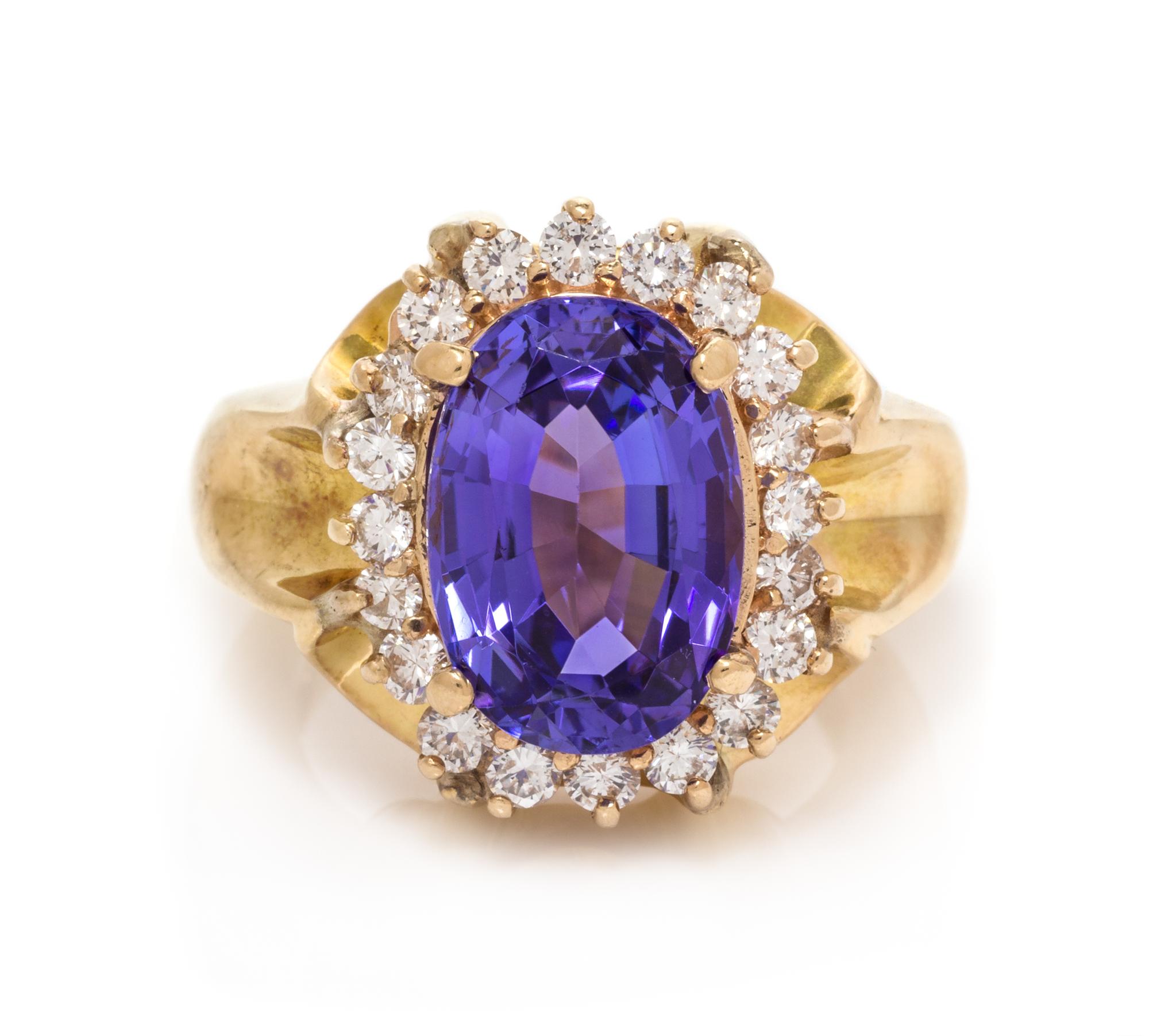 A Yellow Gold, Tanzanite and Diamond Ring, 14.85 dwts.