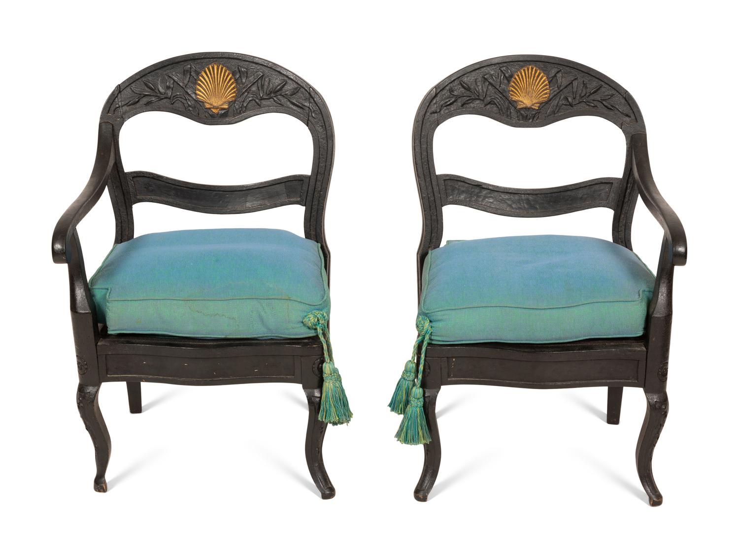 A Pair of Italian Black-Painted and Parcel Gilt Gondola Chairs