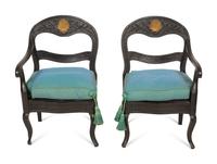 A Pair of Italian Black-Painted and Parcel Gilt Gondola Chairs