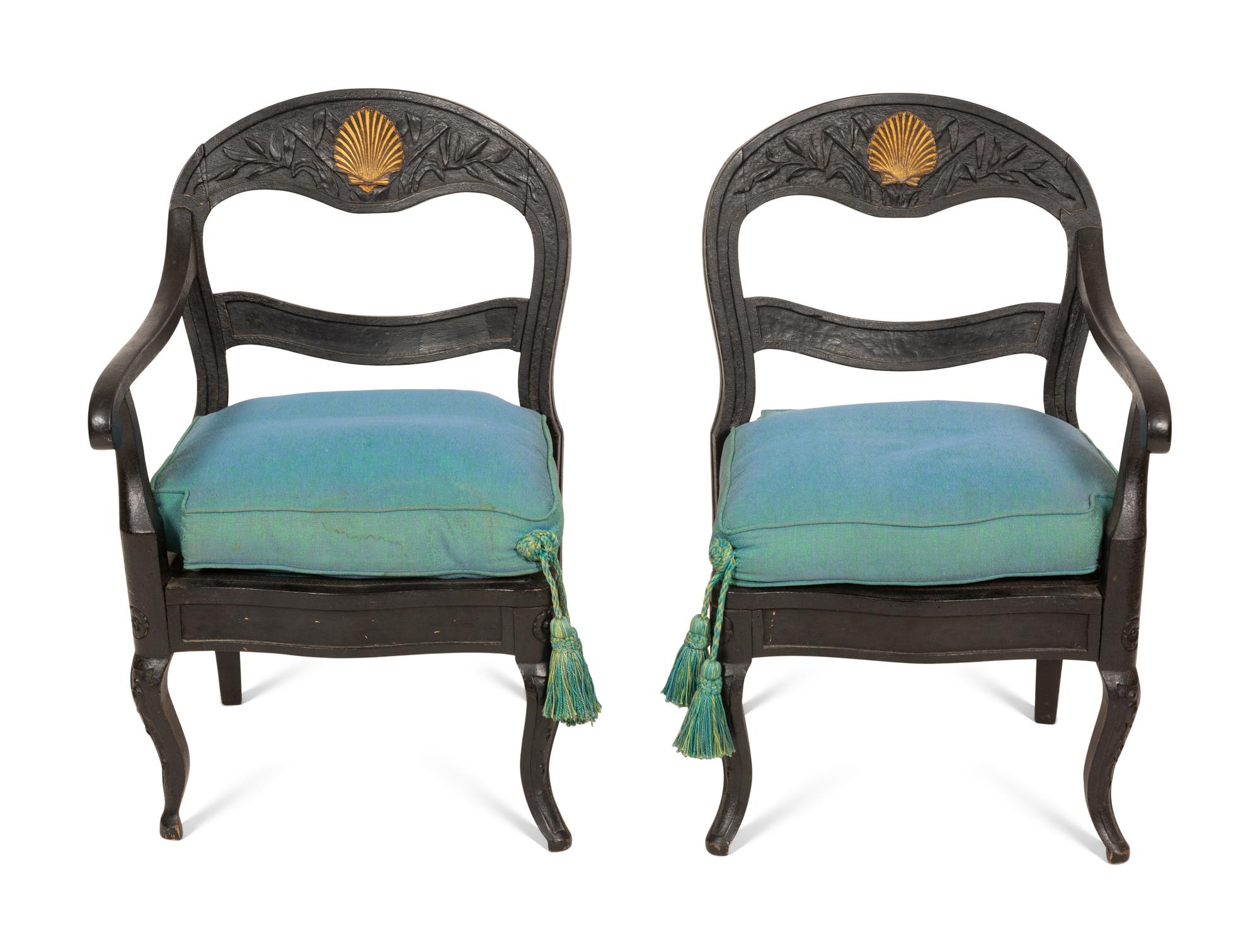 A Pair of Italian Black-Painted and Parcel Gilt Gondola Chairs
