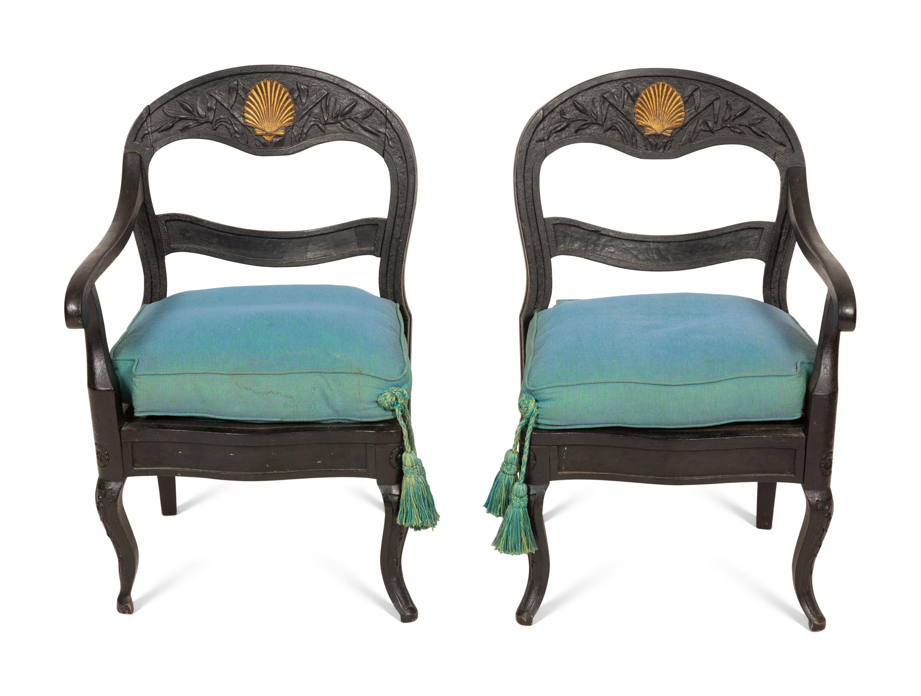 A Pair of Italian Black-Painted and Parcel Gilt Gondola Chairs