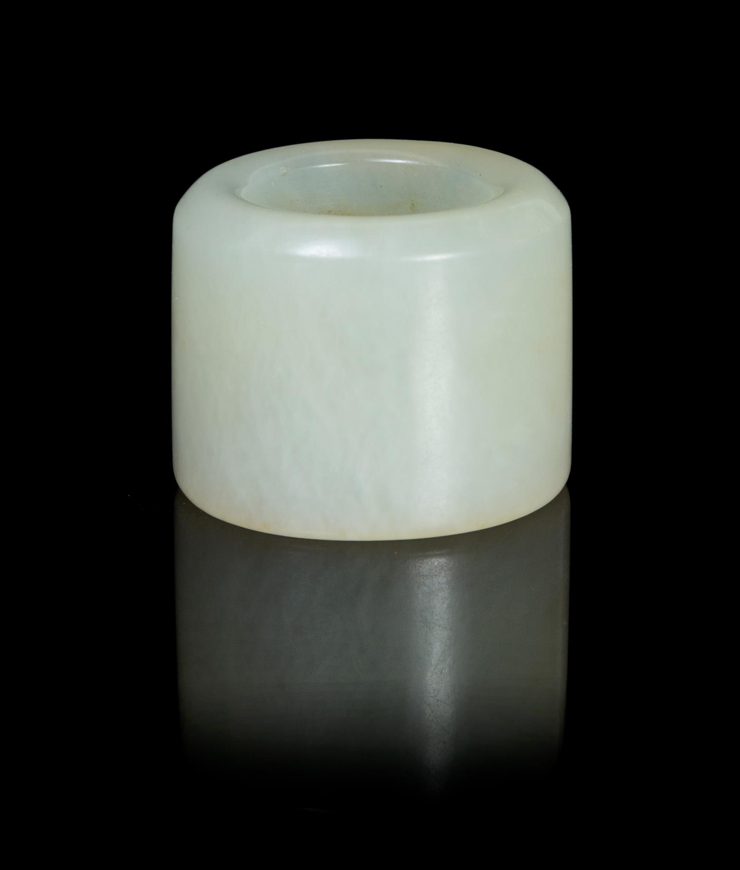A Pale Celadon Jade Archer's Ring Diameter overall 1 1/4 inches.