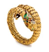 An 18 Karat Yellow Gold, Diamond and Polychrome Enamel Lion Motif Flexible Cuff Bracelet, 69.75 dwts.
