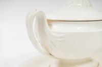 A French White Glazed Faïence Tureen and Underplate