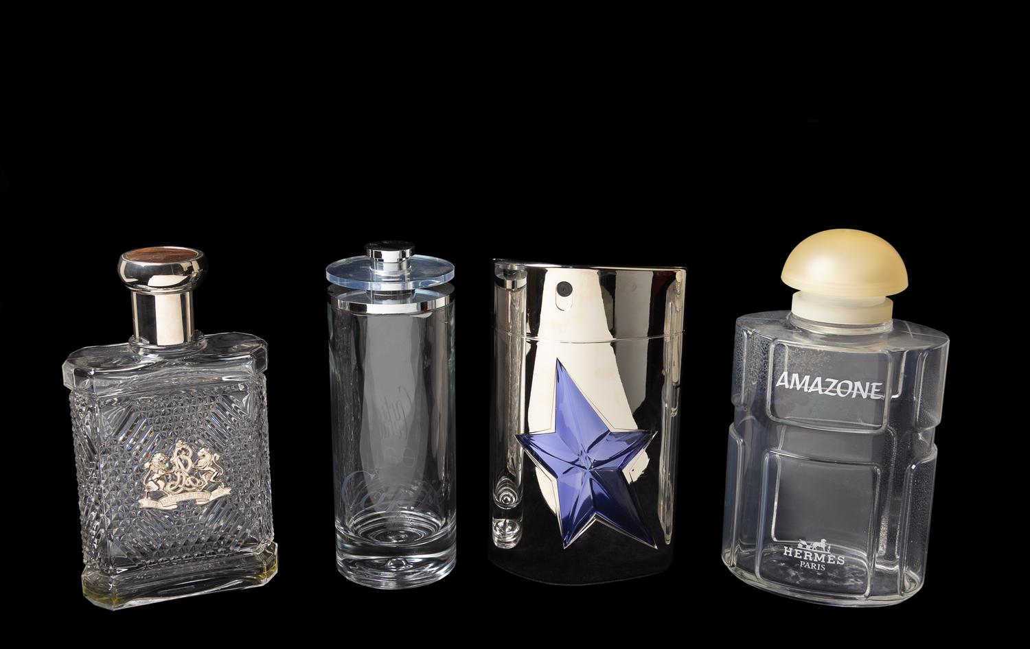 A Group of Four Factice Perfume Bottles