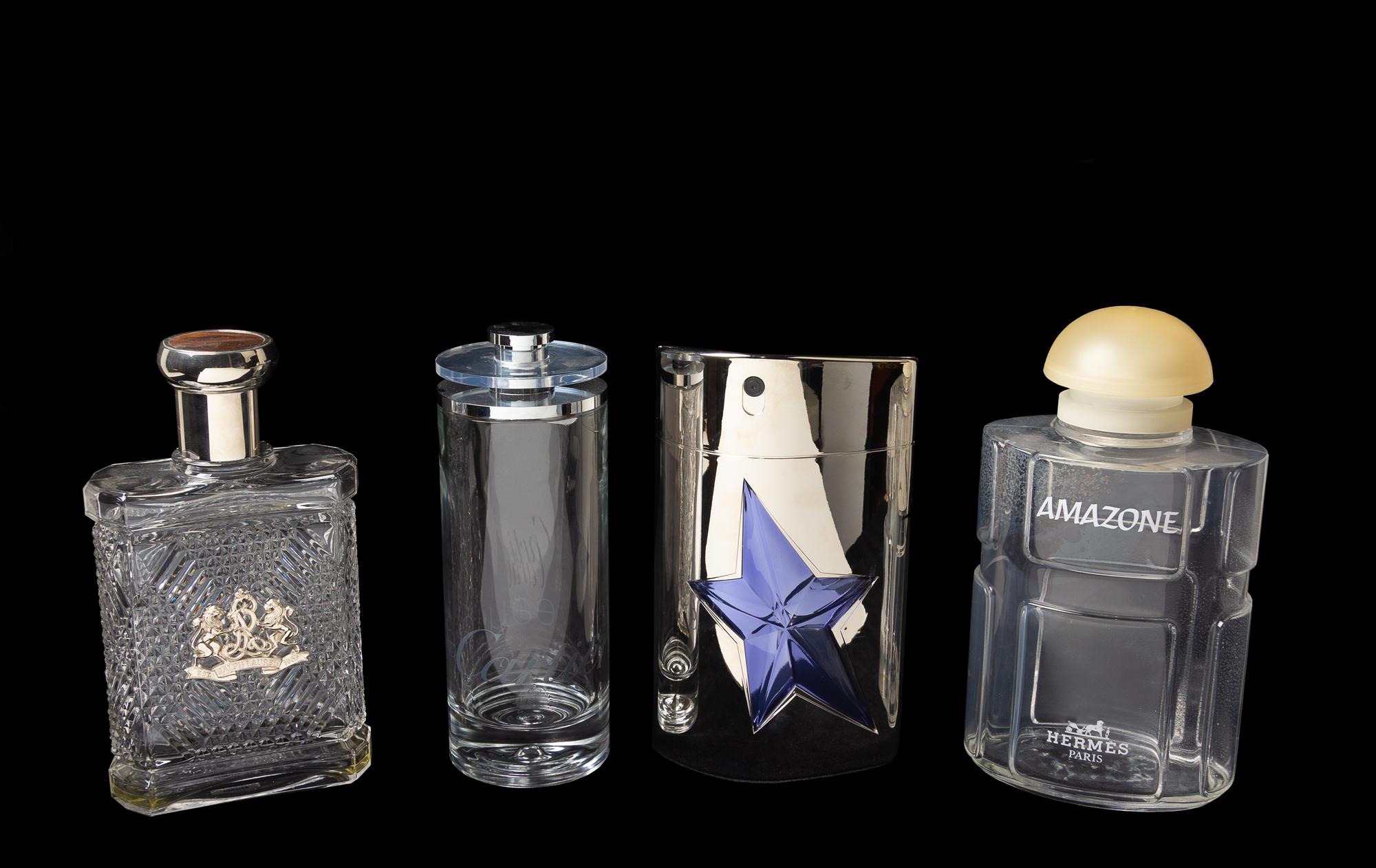 A Group of Four Factice Perfume Bottles