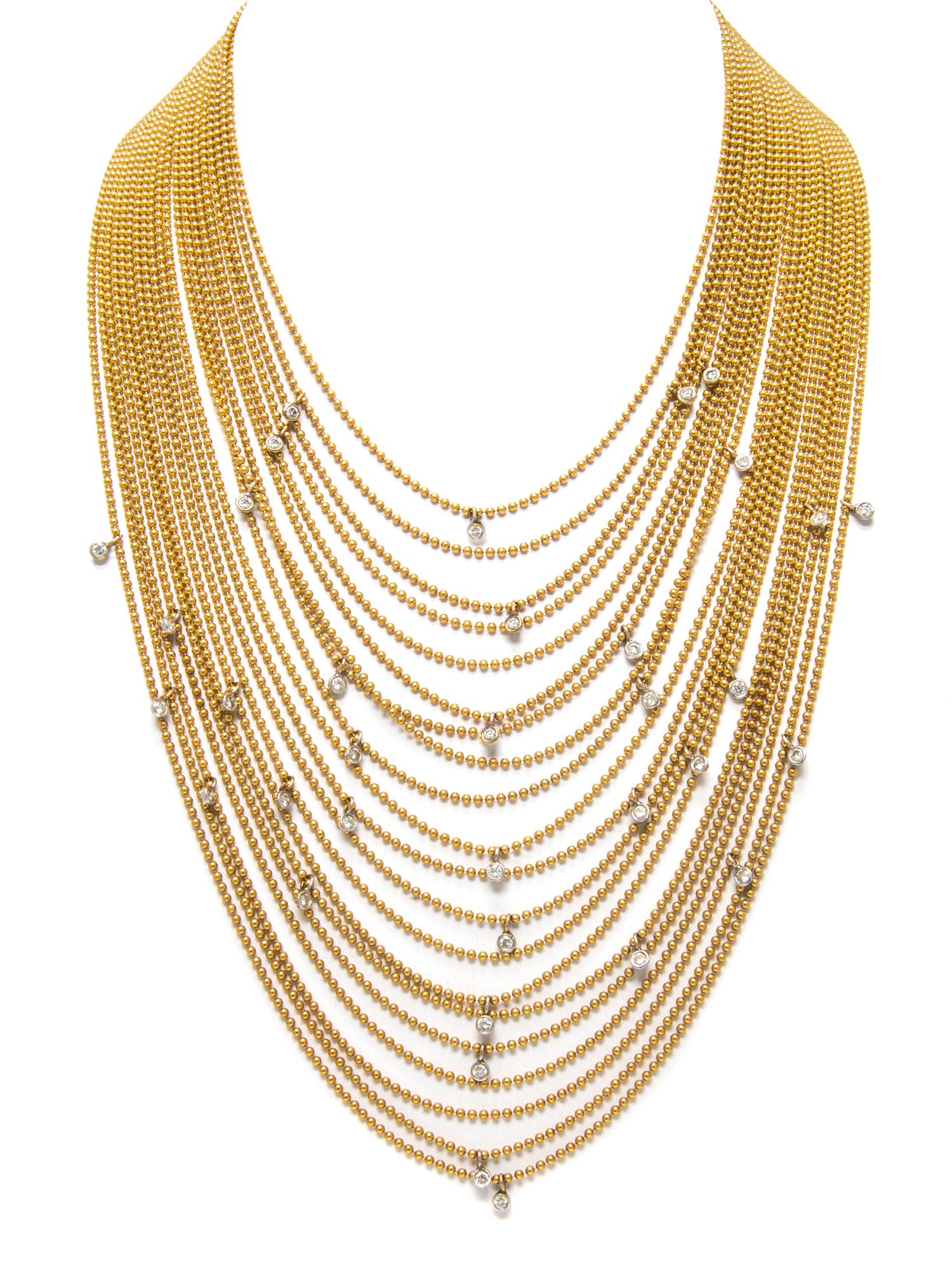 A Yellow Gold and Diamond Bib Necklace, 63.70 dwts.