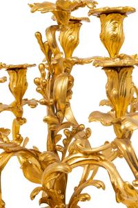 A Pair of Louis XV Style Gilt Bronze Figural Ten-Light Candelabra