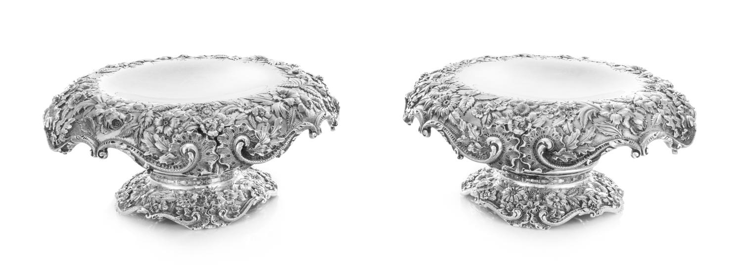 A Pair of American Silver Tazze, S. Kirk & Son, Baltimore, MD, each having a downturned border and rim with repousse floral, foliate an