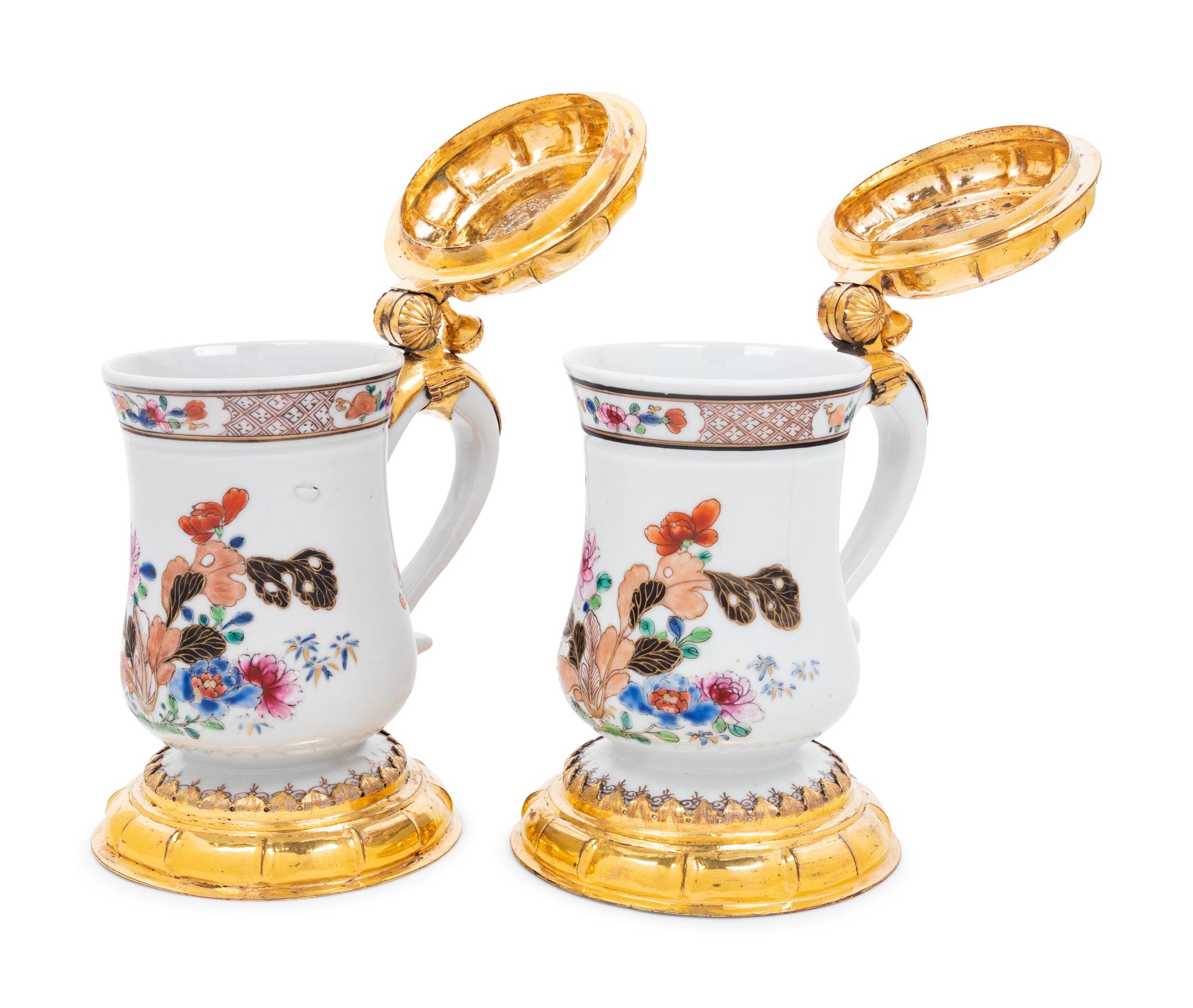 A Pair of Silver-Gilt Mounted Famille Rose Porcelain Tankards