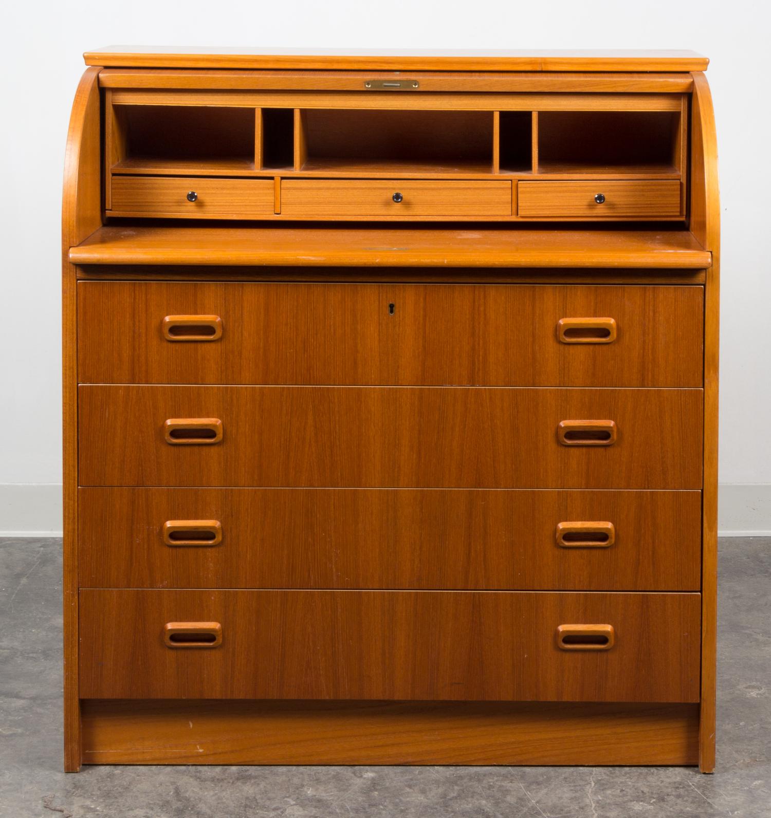 A Danish Teak Roll Top Desk Height 38 1/8 x width 35 1/2 x depth 18 1/2 inches.
