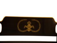 A Regency Style Ebonized and Gilt Four-Poster Bed
