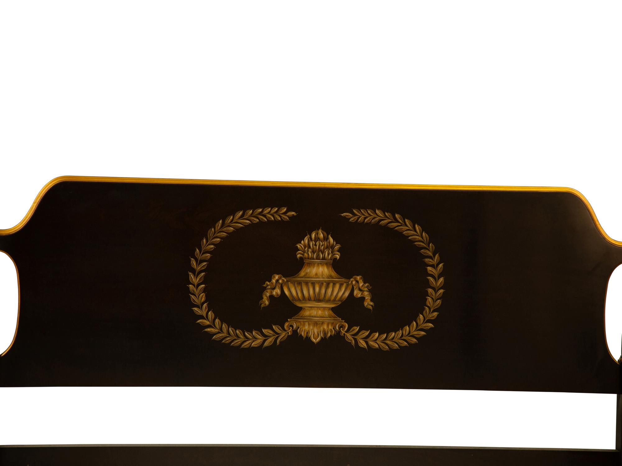 A Regency Style Ebonized and Gilt Four-Poster Bed