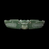 A Costa Rican Jade Two-Headed Bar Pendant