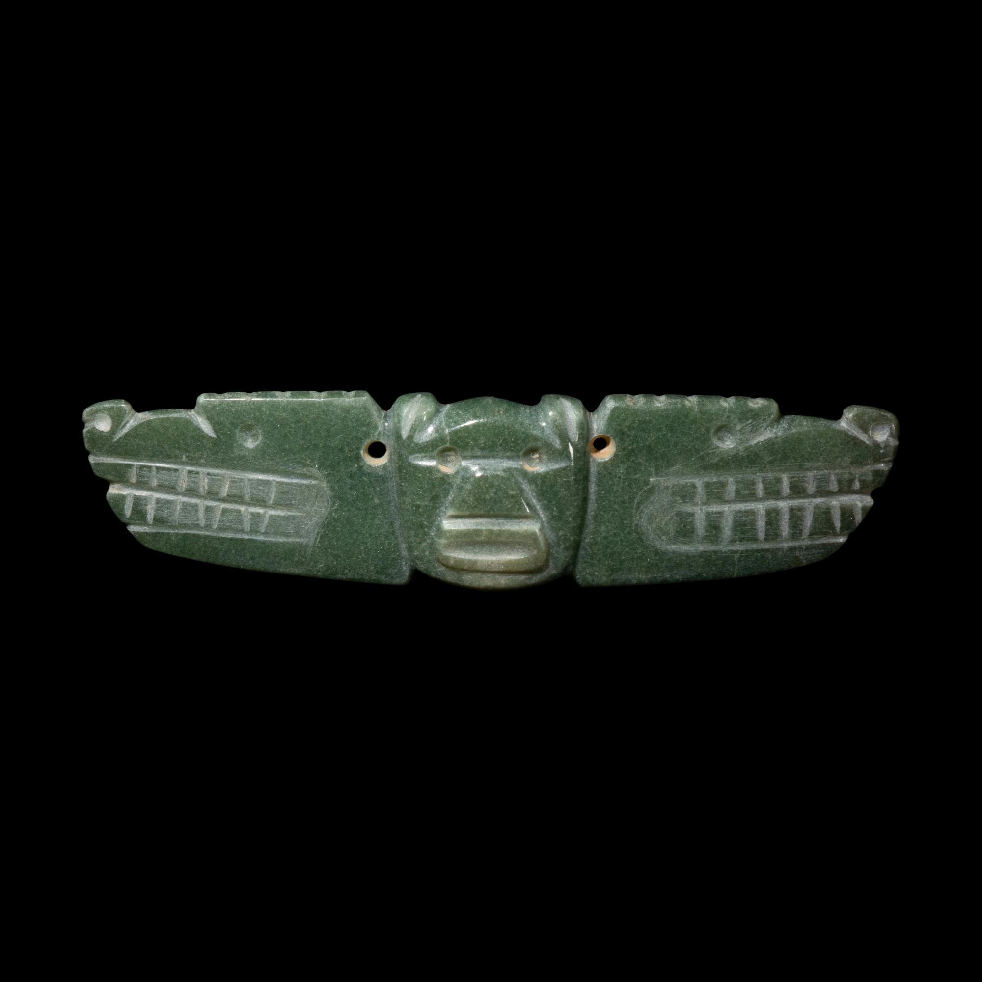 A Costa Rican Jade Two-Headed Bar Pendant