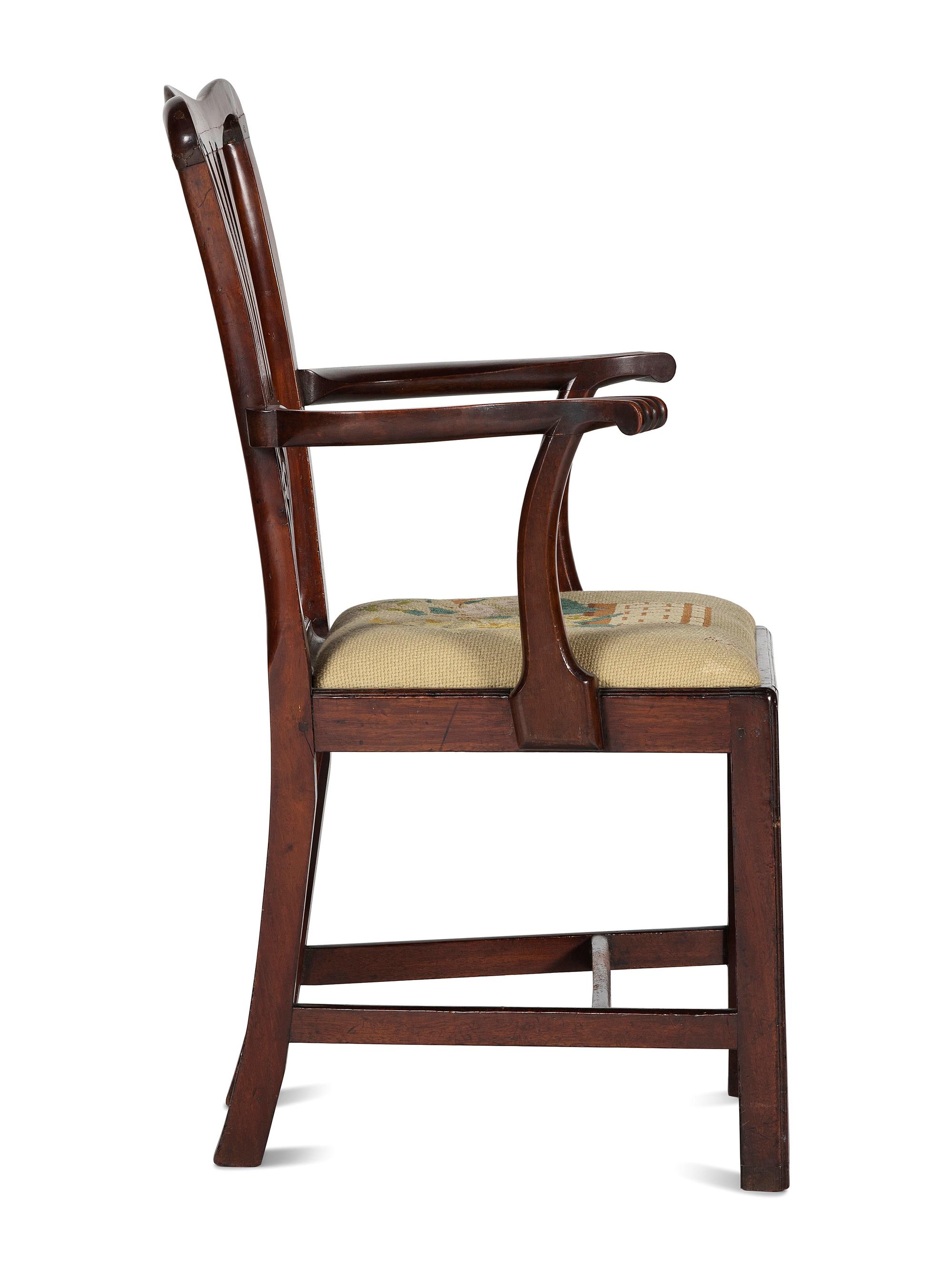 A Chippendale Carved and Figured Mahogany Armchair