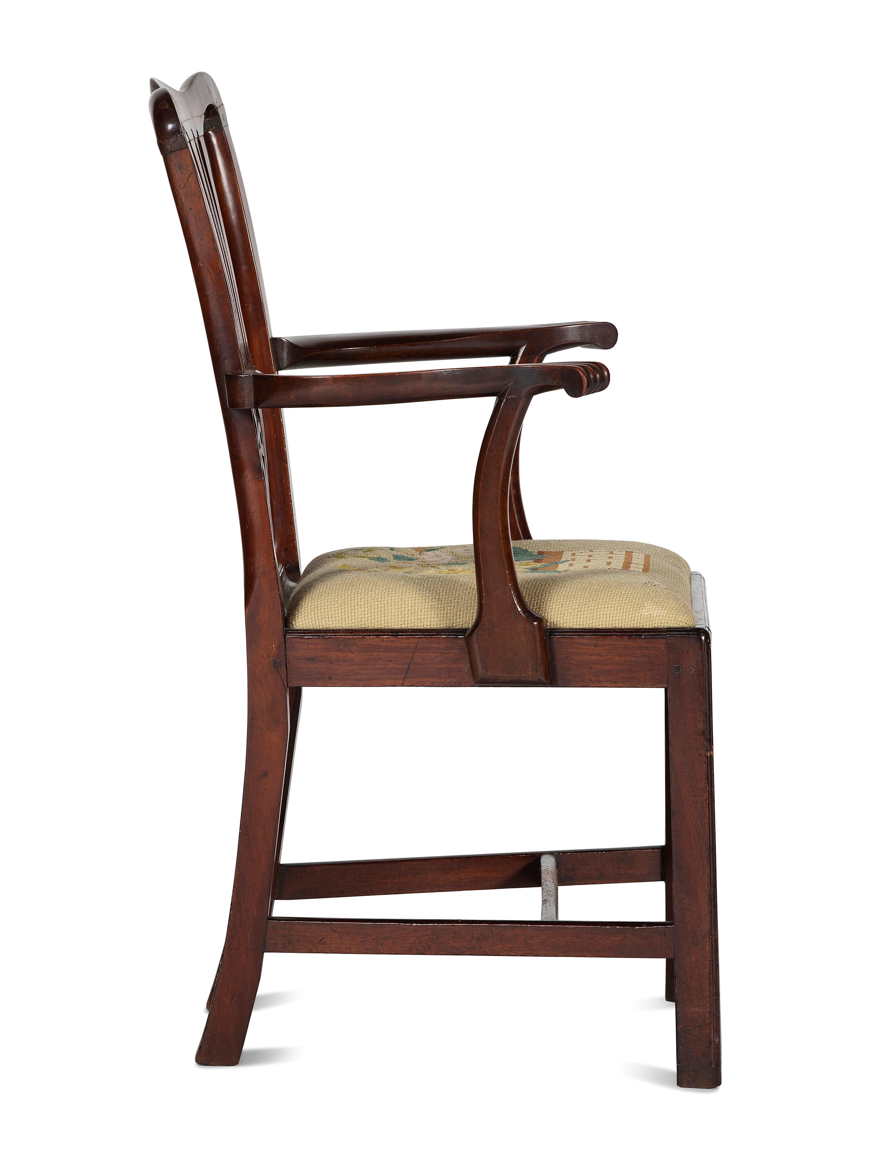 A Chippendale Carved and Figured Mahogany Armchair