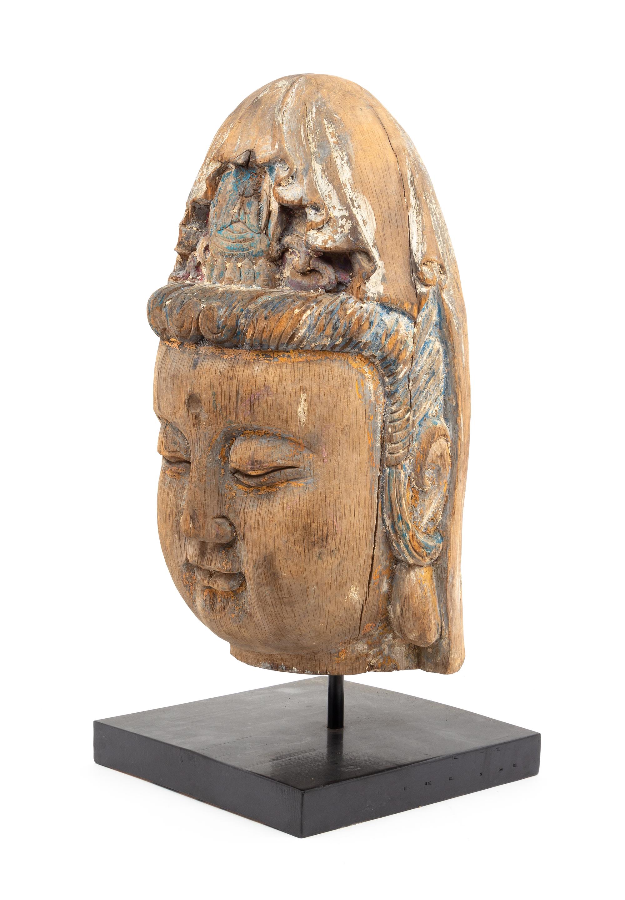 A Large Carved Wood Head of Guanyin Height 19 1/2 inches. — MING DYNASTY (1368-1644)