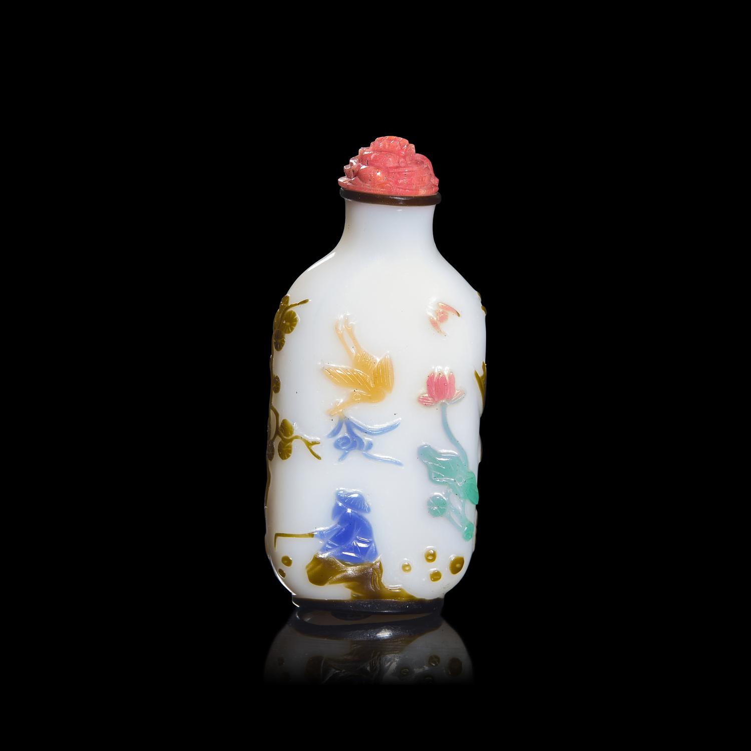 A Chinese Yangzhou Type Carved Multicolor Overlaid Glass Snuff Bottle