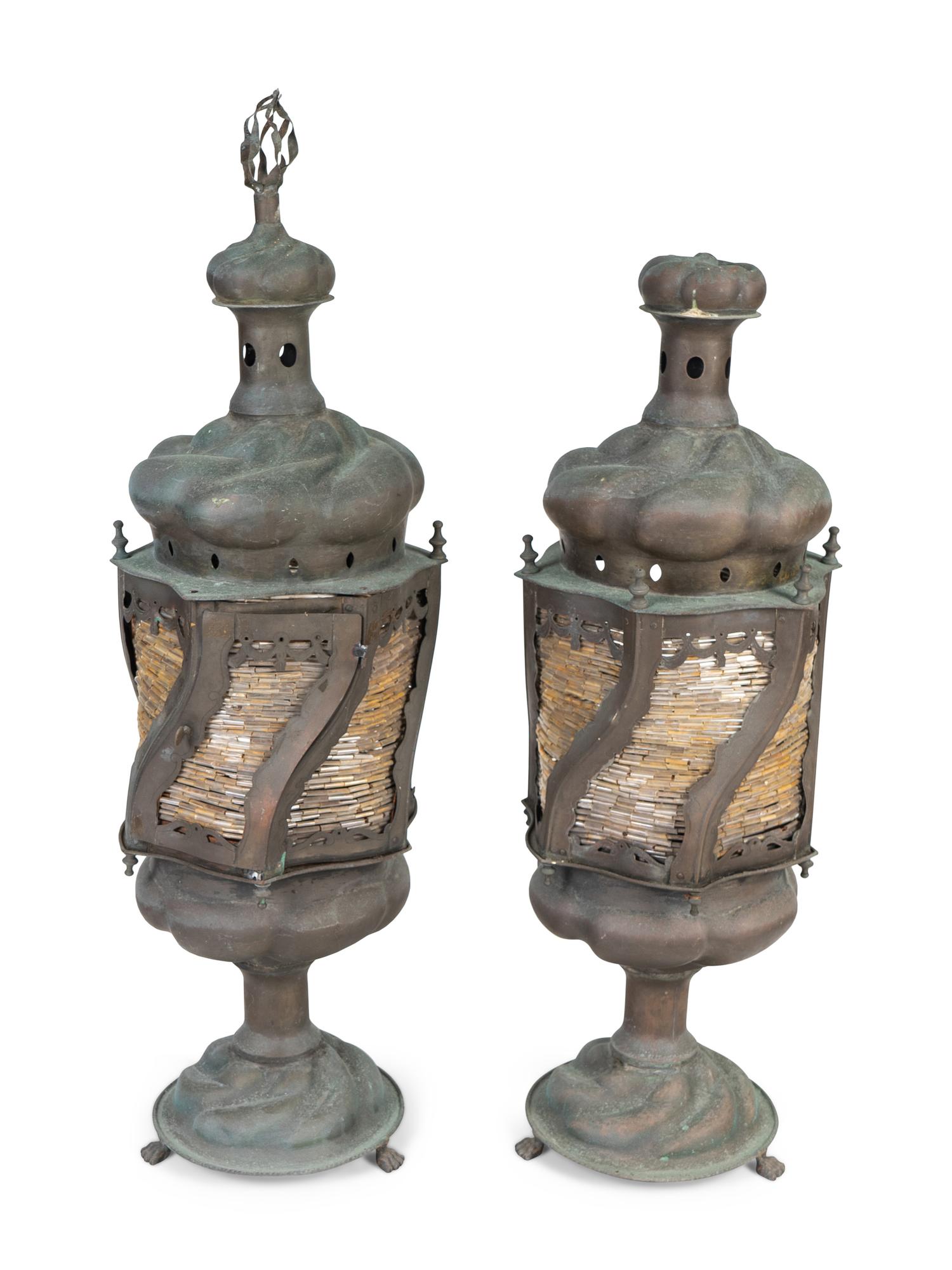 A Pair of Middle Eastern Patinated Metal And Beaded Glass Lanterns