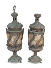 A Pair of Middle Eastern Patinated Metal And Beaded Glass Lanterns