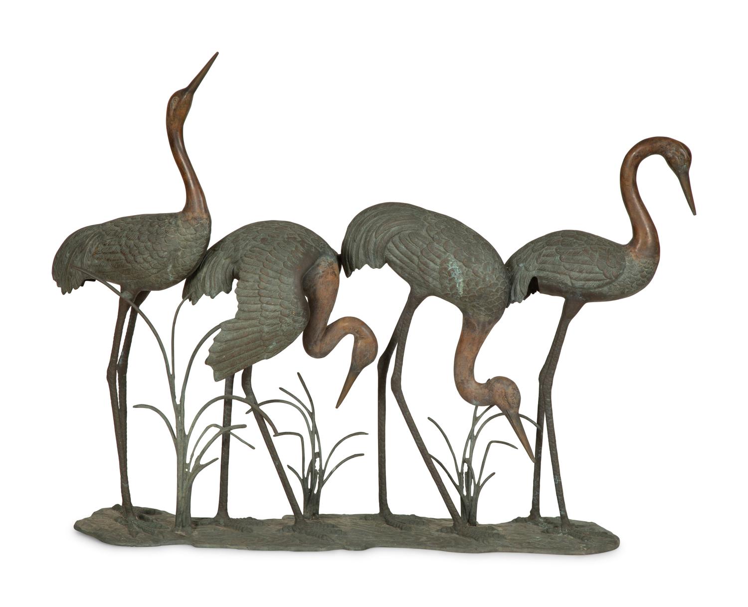 A Bronze Sculpture of Four Standing Cranes