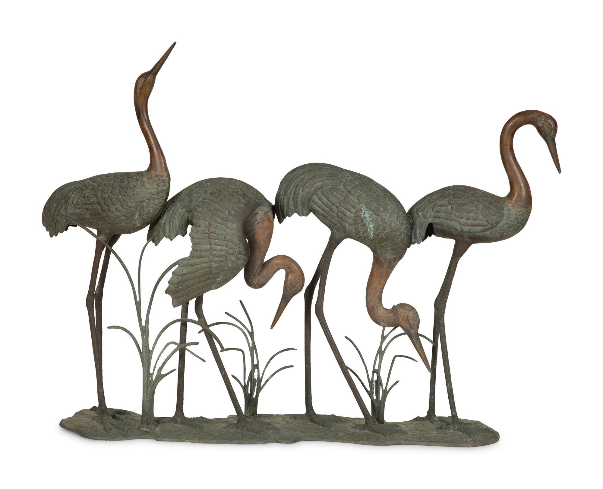A Bronze Sculpture of Four Standing Cranes