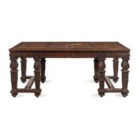 An Italian Carved Oak Writing Table