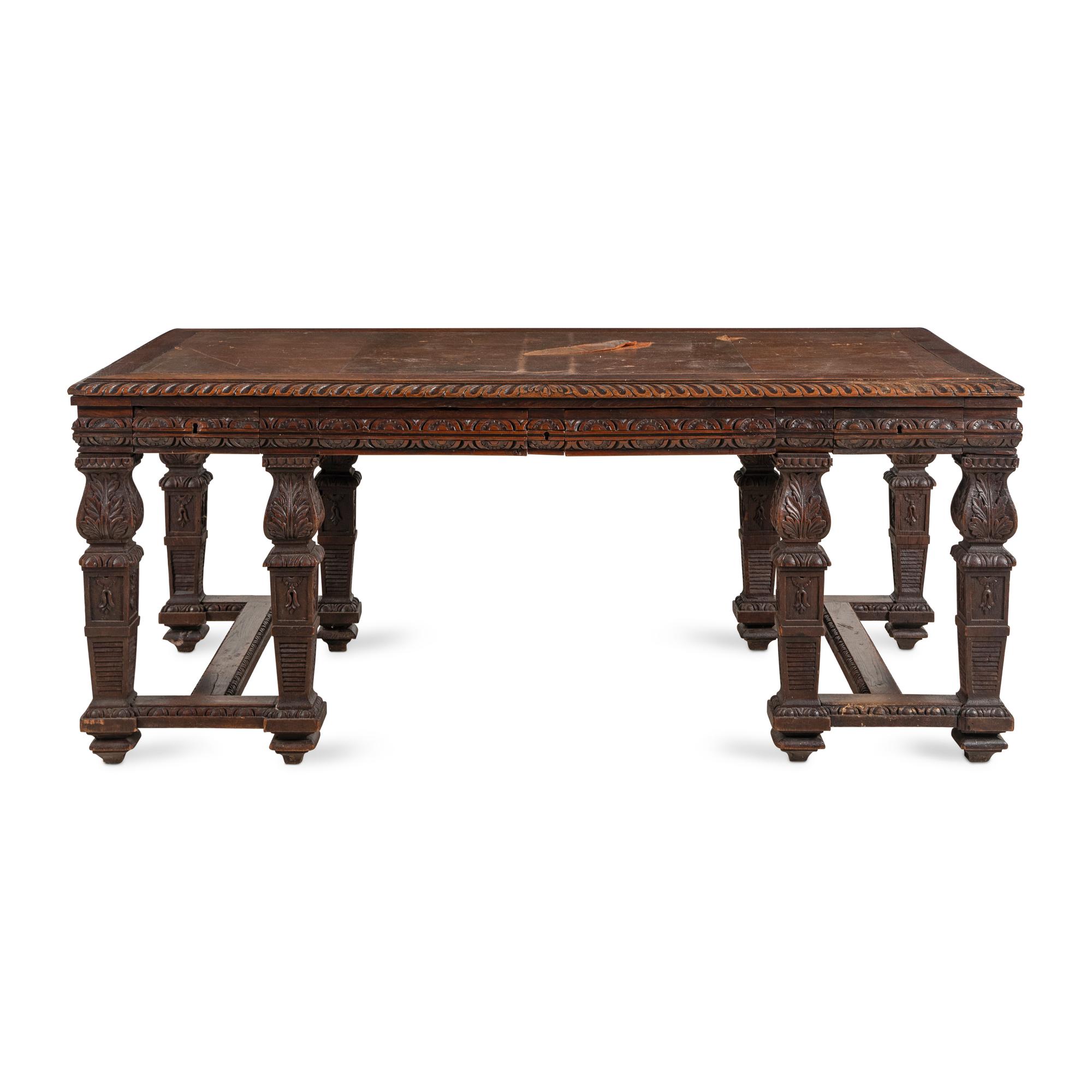 An Italian Carved Oak Writing Table