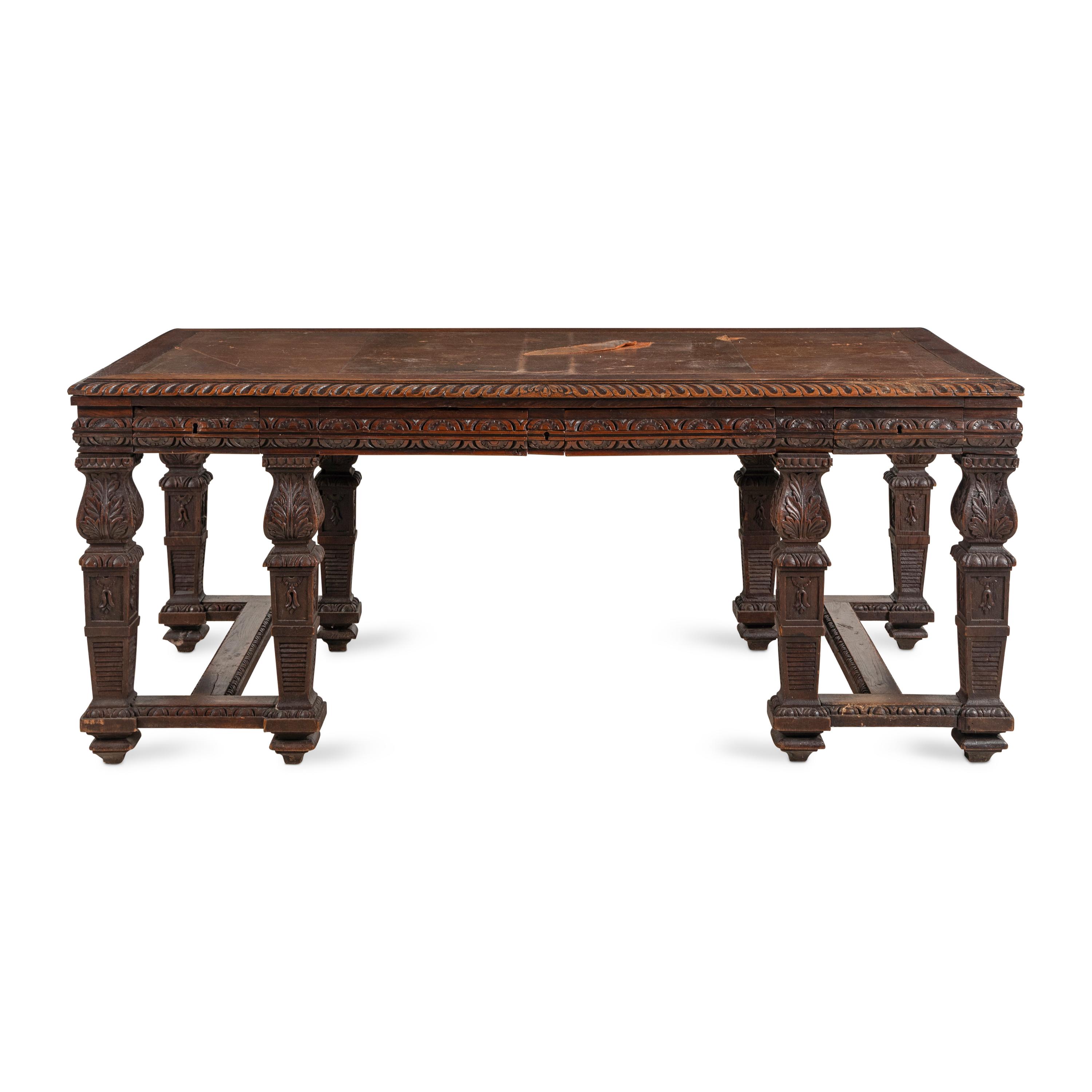 An Italian Carved Oak Writing Table