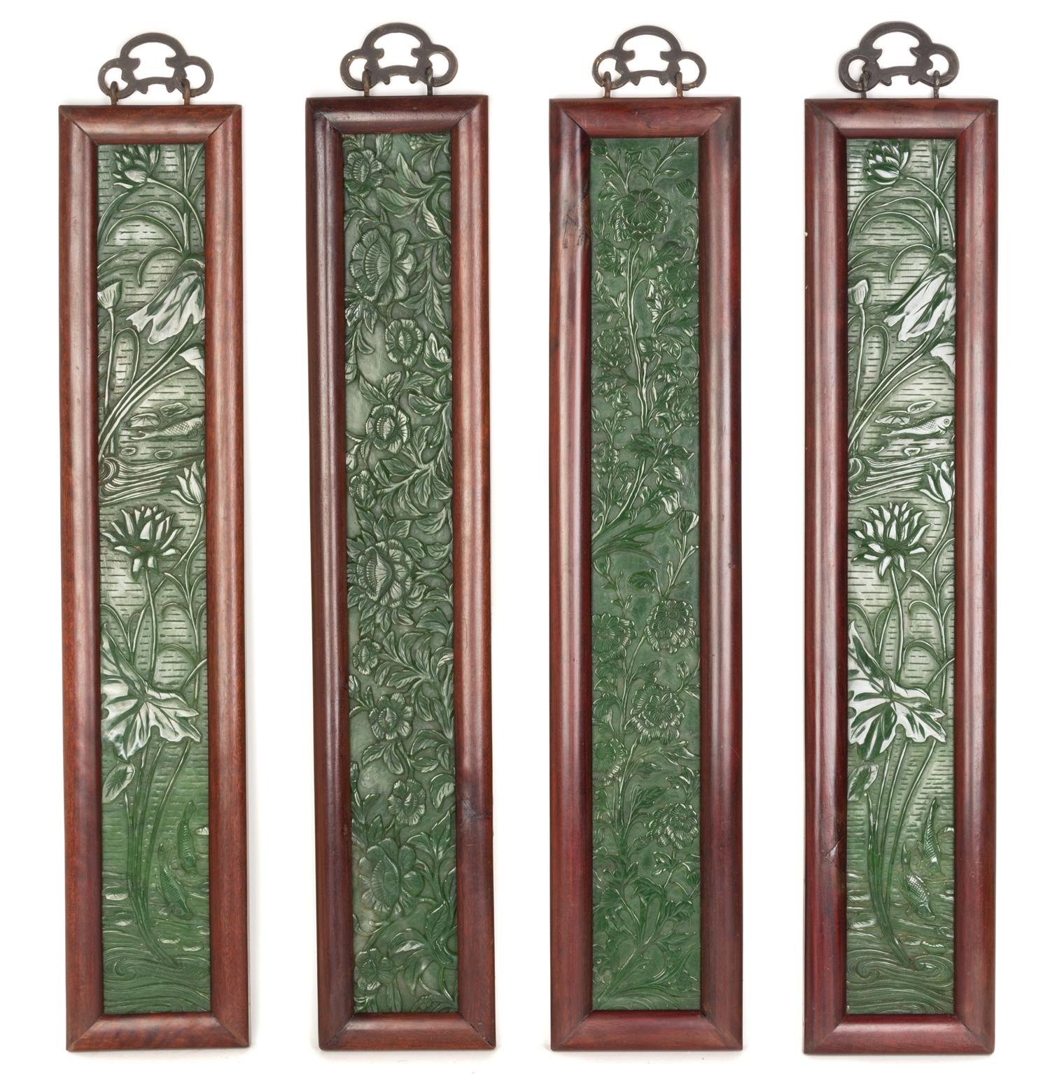 A Set of Four Chinese Jade Plaques Height 24 1/4 x width 3 1/2 inches.