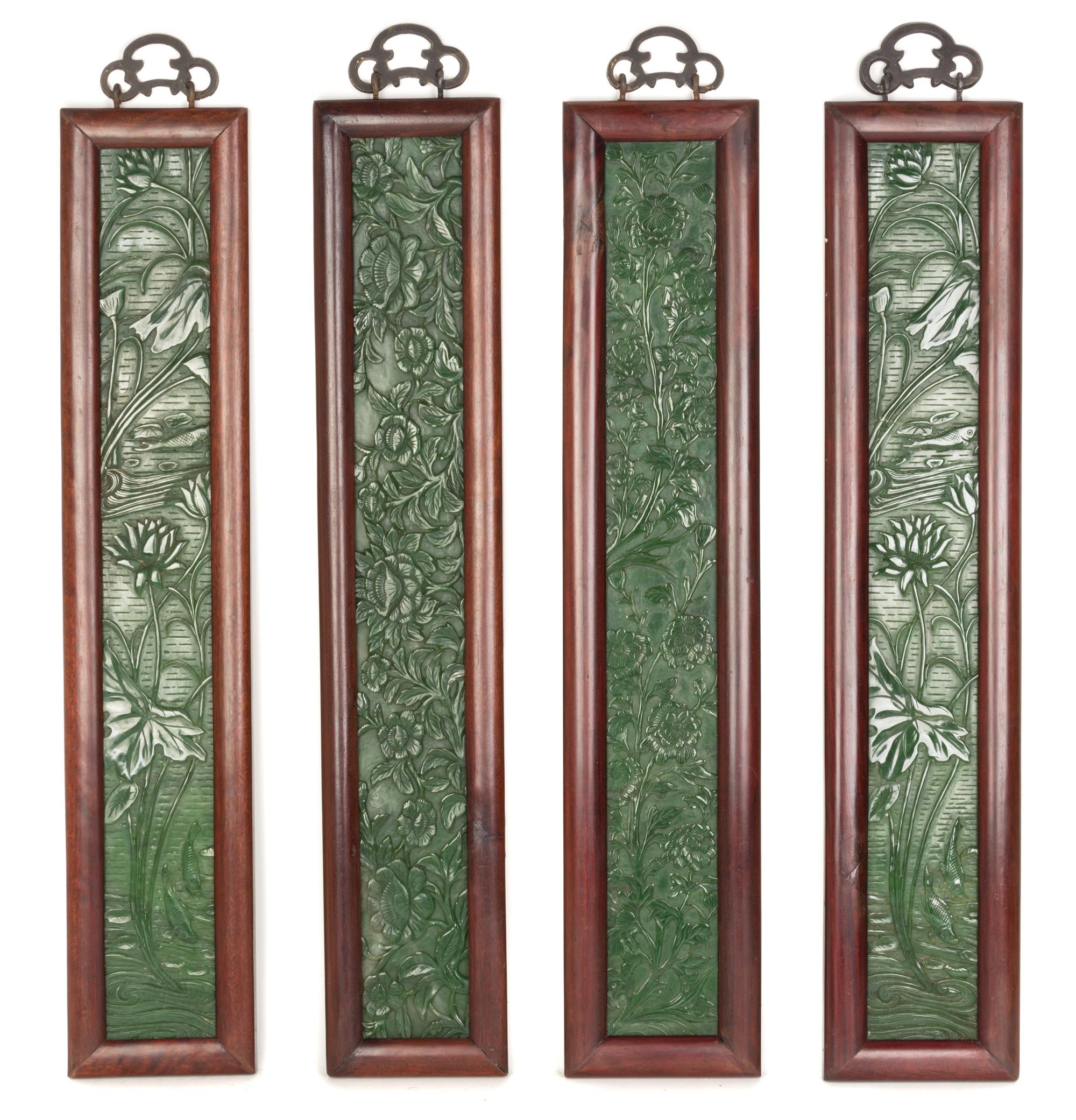 A Set of Four Chinese Jade Plaques Height 24 1/4 x width 3 1/2 inches.