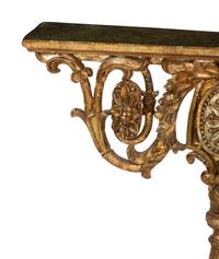 An Italian Carved Giltwood Faux Marble-Top Console Table