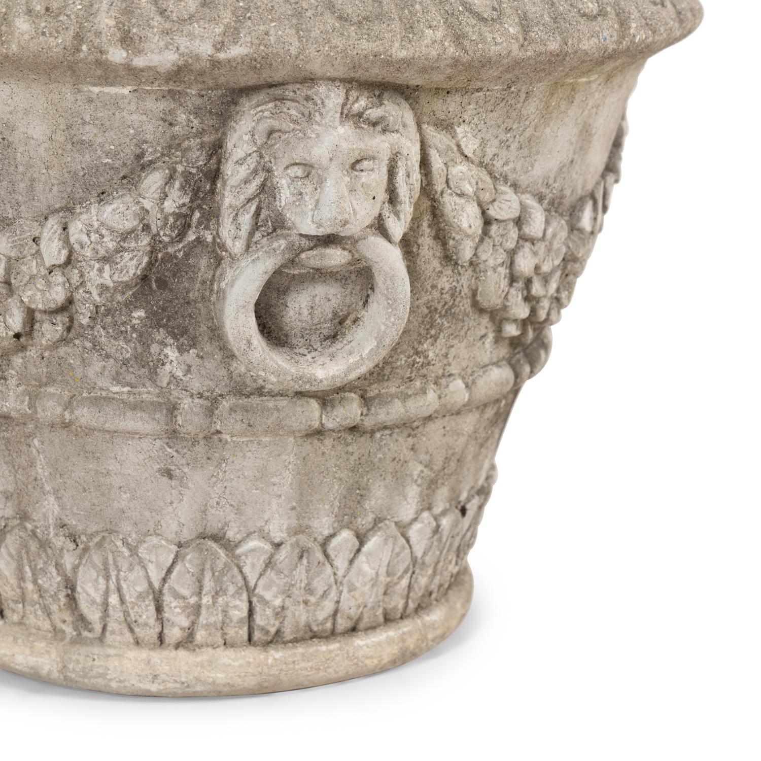A Set of Four Cast Stone Jardinières