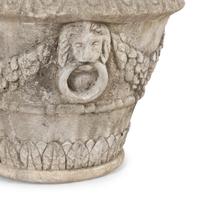 A Set of Four Cast Stone Jardinières