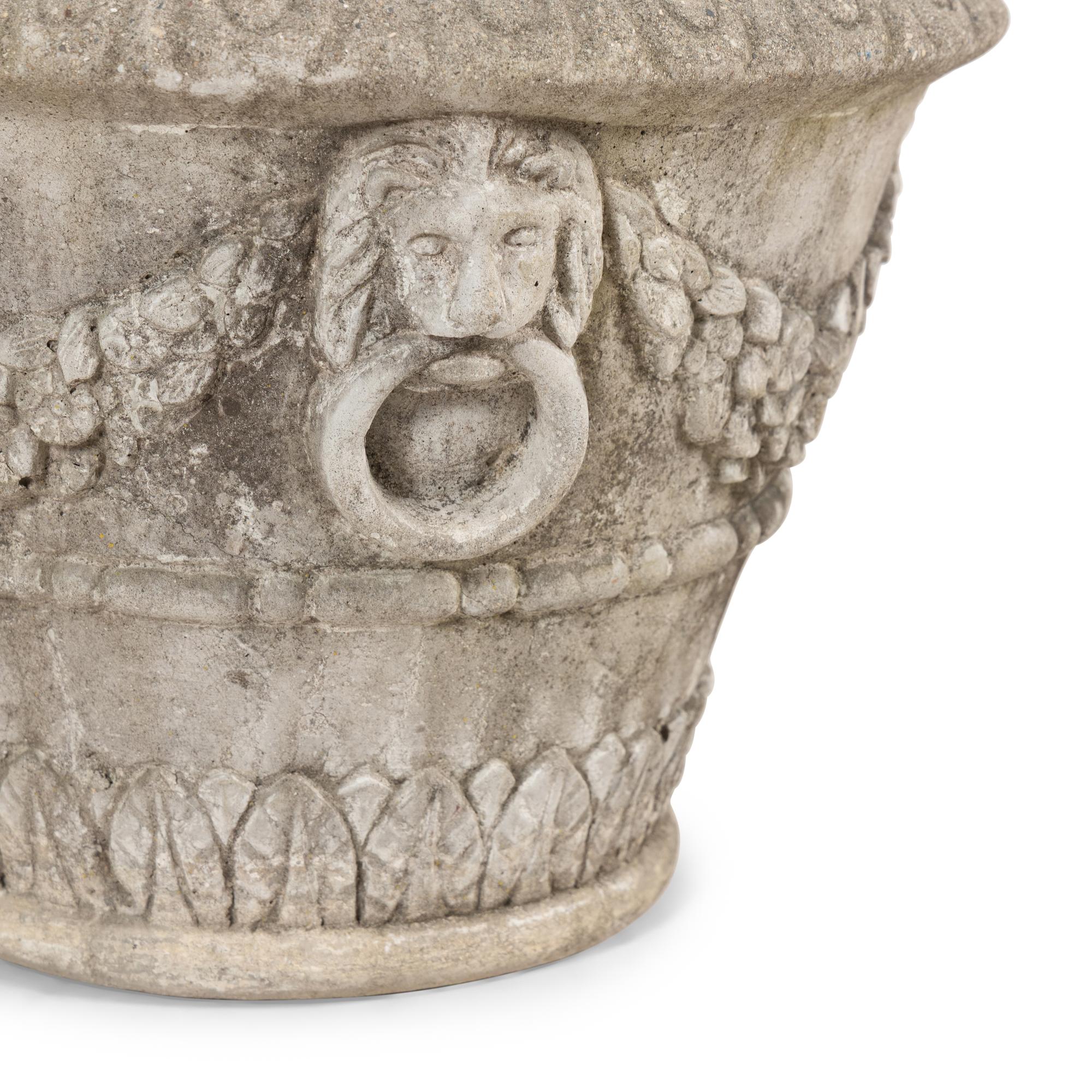 A Set of Four Cast Stone Jardinières