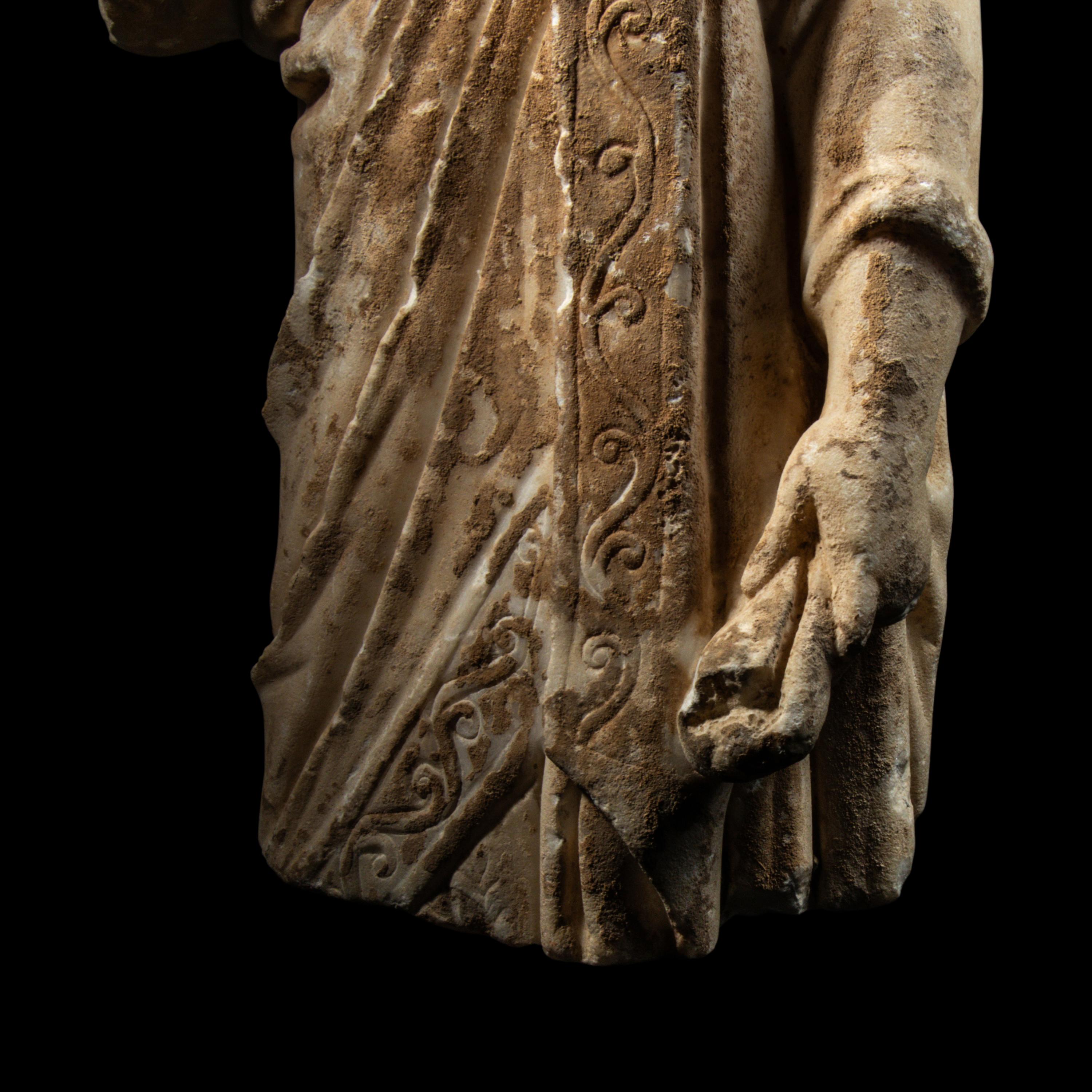 A Late Roman or Byzantine Marble Togatus Holding a Mappa